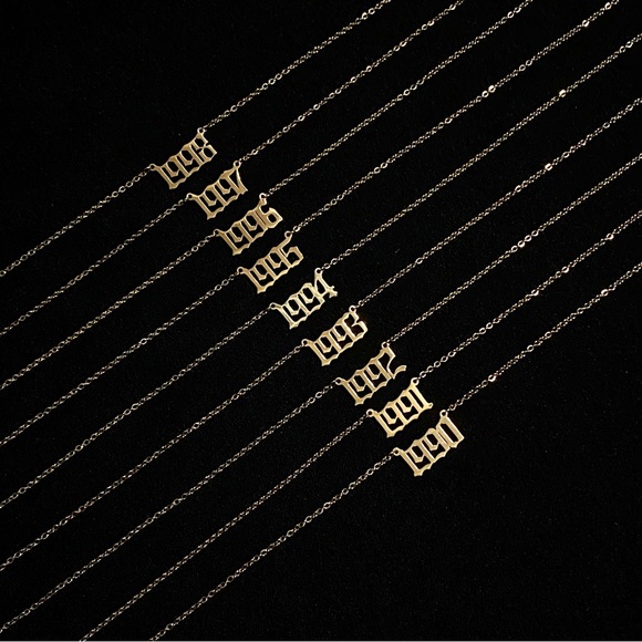 Jewelry - 18K gold sterling silver year necklace 1990